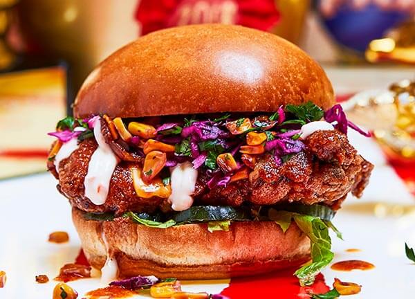 Buttermilk fried chicken burger with cheese and slaw