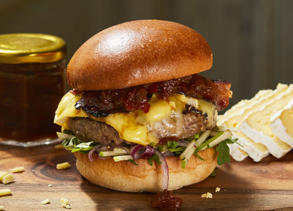 Reading Market Place- A beef burger with, bacon, Waterloo & Heckfield cheese, apple slaw, tomato, & chilli chutney, rocket, pickles, rosemary chips